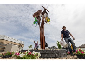 Cornell Design & Landscaping is working on some final touches ahead of the unveiling of the new Broncos Memorial Garden outside the Humboldt District Health Complex.  Photo taken in Saskatoon, Sask.  Wednesday, June 22, 2022.