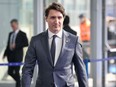 Canada's Prime Minister Justin Trudeau arrives ahead of an extraordinary NATO summit at NATO Headquarters in Brussels on March 24, 2022. (Photo by Kenzo TRIBOUILLARD / AFP)