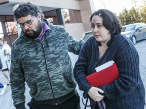 Edward and Jennifer Neville-Lake walk into the Newmarket Courthouse in Newmarket, Ont., Feb. 23, 2016.