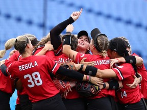 The Canadian women's softball team celebrates a bronze medal at the Tokyo Olympics in 2021.
