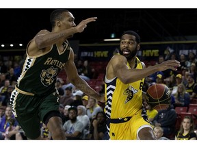 Saskatchewan Rattlers' Tony Carr (4), shown here in this file photo battling Edmonton Stingers's Adika Peter-McNeilly (6) during Canadian Elite Basketball League action in Edmonton, Sunday May 29, 2022, led Saskatchewan in scoring against Fraser Valley with 25 points. Photo By David Bloom