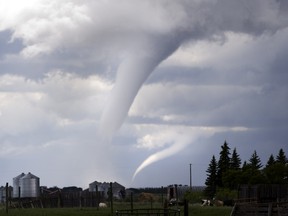 Social media users from several areas have posted pictures and video of funnel clouds and tornados, like this one near Asquith, approximately 40km west of Saskatoon, in 2012.