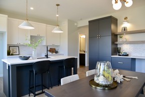 With an open concept kitchen, dining room and living room, the Sloane floor plan is perfect for entertaining.