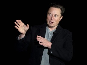 Elon Musk gestures as he speaks during a press conference at SpaceX's Starbase facility near Boca Chica Village in South Texas, Feb. 10, 2022.