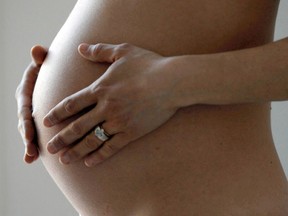 A woman in the last trimester of her pregnancy, posing on March 26, 2016.