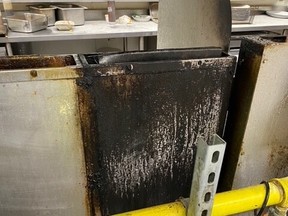 A charred deep fryer at an 8th Street East restaurant that the Saskatoon Fire Department says caught on fire due to a lack of cleaning. (Saskatoon Fire Department)