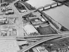 This April 28, 1987, photo shows the Saskatoon Arena, centre, above Idylwyld Drive, and the A.L. Cole power plant on the other side of Idywyld. In an Oct. 23, 1985 referendum, Saskatoon voters rejected building a replacement arena on the A.L. Cole site. Six months later, voters backed building a new arena in another referendum. (The StarPhoenix)