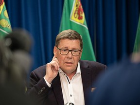 Saskatchewan Premier Scott Moe answers questions during a press conference at the Saskatchewan Cabinet Office on 22nd Street East. Photo taken in Saskatoon, Sask. on Tuesday, July 5, 2022.