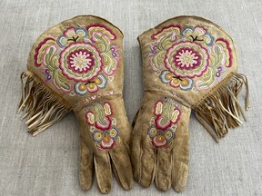 This undated photo provided on Wednesday, July 20, 2022, by Gregory Scofield, shows a pair of gauntlets he made in the late 19th-century Cree-Metif native Canadian traditional style.  The Vatican's Anima Mundi Ethnological Museum houses tens of thousands of artifacts and art made by Indigenous peoples from around the world. The restitution of Indigenous and colonial-era artifacts, a pressing debate for museums and national collections across Europe, is one of the many agenda items awaiting Francis on his trip to Canada, which begins Sunday.