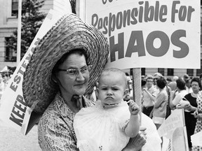 Anger over medicare's implementation 60 years ago as expressed by this Estevan mother in a July 1962 march was similar to the anger aimed at governments over COVID-19 restrictions.