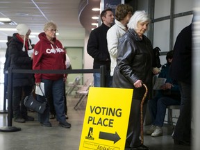 Voters stand in line for the advanced polls for the Saskatoon Meewasin byelection on Feb. 24, 2017.