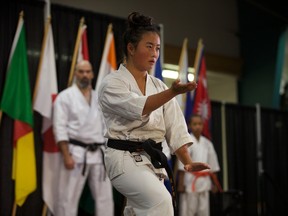 Saskatoon martial arts karate practice with Andrea Lau demonstrating at Folkfest.