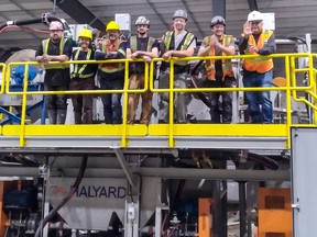 The installation team stands atop the Dense Media Separator (DMS), the first major equipment installation at Vital Metal's Saskatchewan Extraction Facility in Saskatoon. Once completed, the facility will process ore from the Nechalacho rare earth mine in the Northwest Territories into a mixed rare earth carbonate destined for a Norwegian refinery for final separation into individual rare earth elements and eventually electric vehicle motors.  PHOTO: Courtesy Vital Metals/Ray Anguelov