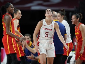 Canada's Kia Nurse (5), centre, reacts after losing the ball during women's basketball preliminary round game against Spain at the 2020 Summer Olympics, Sunday, Aug. 1, 2021, in Saitama, Japan. Nurse and Karina LeBlanc are among a star-studded group of Canadian women tasked with helping determine the course for professional women's sport in Canada.