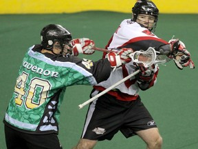 Cam Sedgwick (right), shown in 2010 while playing with the NLL's Washington Stealth, has been hired as the Saskatchewan Rush offensive coach.