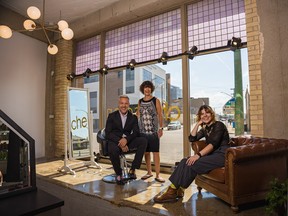 From left, owners Kim Regier and Dianne Laidlaw-Regier pose with their daughter salon manager Alycia Regier, centre, at the new location of Chel Spa as of May 2022 in the Fairbanks-Morse Building in downtown Saskatoon.