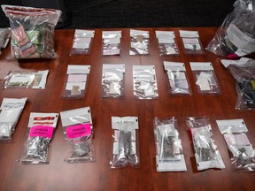 A seizure of illegal drugs and cash is displayed during a news conference at Surrey RCMP Headquarters, in Surrey, B.C., on Thursday, September 3, 2020. As Toronto waits to hear whether the federal government will grant its request to decriminalize the possession of illicit drugs for personal use in the city, harm reduction advocates say approval is urgently needed as governments fail to match the gravity of the opioid crisis.