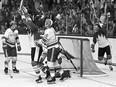 Team Canada players celebrate a goal against USSR's Vladislav Tretiak during the 1972 Summit tournament in Toronto on Sept. 4, 1972.