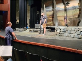 Joshua Beaudry (left) directs Nathan Howe and Skye Brandon in a rehearsal for Stone in His Pockets. This is Beaudry's first time directing on Persephone Theatre's main stage.