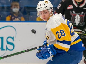 Saskatoon Blades forward Lukas Hansen looks at the puck during the first period of WHL action at SaskTel Centre in Saskatoon on Tuesday, Dec. 28, 2021.
