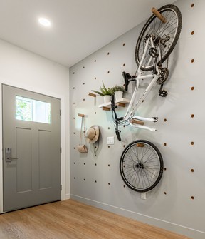 Peg walls are located at each entrance of the parade home, ideal for storing jackets, bikes or scooters.