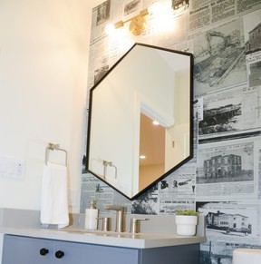 Hometown Homes’ design team sourced historic newspaper articles and photos from the Saskatoon Public Library, and had them made into wallpaper by a local company. The wallpaper adorns the show home’s main floor powder room.