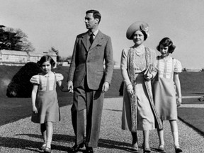 Photo taken at Windsor Castle of the royals with a young Elizabeth in 1939. This photo was enlarged and placed on the front of the Toronto Star building where the Royal couple would pass during their tour later that year.