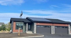 North Ridge Development Corporation has unveiled a new show home at The Pines - their nationally recognized net-zero bungalow-style townhouse that features net-metering solar panels that generate enough clean energy to power the home.