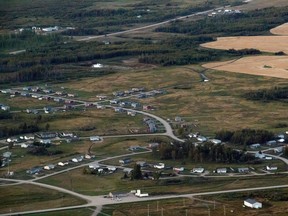 Homes in the indigenous community of James Smith Cree Nation are seen in this aerial photo in Saskatchewan, Canada on Tuesday, Sept. 6, 2022. (Photo by Cole BURSTON / AFP)