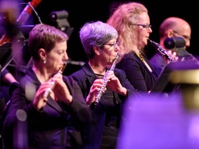 Saskatoon Symphony Orchestra principal oboe Erin Brophey (right) performs with Randi Nelson (centre), who served as principal flute with the SSO for nearly 50 years. (Saskatoon Symphony Orchestra)