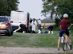 A police forensics team investigates a crime scene after multiple people were killed and injured in a stabbing spree in Weldon, Saskatchewan, Canada. September 4, 2022.  REUTERS/David Stobbe/File Photo
