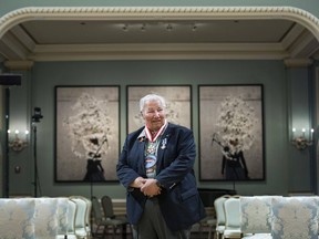 Justice Murray Sinclair, who was Manitoba's first Indigenous judge, led the Truth and Reconciliation Commission and served as a senator, stands in the ballroom at Rideau Hall after being invested as a companion of the Order of Canada and receiving a Meritorious Service Decoration (Civil Division), in Ottawa, Thursday, May 26, 2022. Sinclair says the argument the federal government made in 2015 that the Catholic Church was unlikely to raise the money it promised to residential school survivors is "blatantly dishonest."
