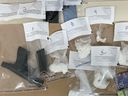 Mohamed Hassan was arrested on Sept. 22, 2022 in Prince Albert in connection with a CRT investigation into drug trafficking. Officers located a loaded handgun, ammunition, just over 120 grams of cocaine, crack cocaine, two cell phones and more than $12,000 in cash. (Prince Albert Police Service)