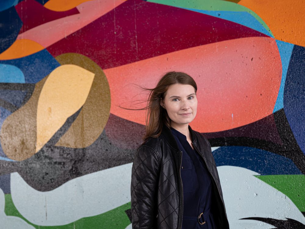 Nuit Blanche Saskatoon board chair Kim Osemlak stands for a photo in front of the Sid Buckwold Bridge mural in Saskatoon, Sept. 14, 2022.