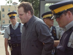 Peter Whitmore enters Regina Queen's Bench Court on July 23, 2007