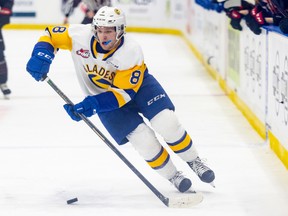 Saskatoon Blades forward Brandon Lisowsky (8) skates the puck up the ice during action against the Moose Jaw Warriors in Saskatoon on Tuesday, April 26, 2022.