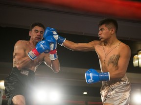 Wayne Smith (left) and Pedro Rodriguez battle during the 2019 Top Dog Invitational at TCU place in Saskatoon.