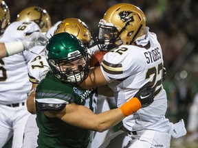 Huskies linebacker Lane Novak, shown making a tackle against Manitoba earlier this season, will square off with the Rams on Saturday.