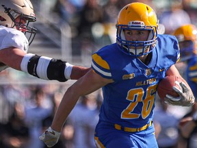 Saskatoon Hilltops running back Carter McLean carries the ball against the Edmonton Huskies in a Prairie Football Conference game at SMF Field. Photo taken in Saskatoon on Sunday, October 3, 2021.
