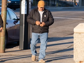 Cecil Wolfe walks into Saskatoon provincial court, where he was being sentenced on 12 counts of sexual assault while working as a medicine man in rural Saskatchewan. Photo taken in Saskatoon, SK, on Wednesday, Oct. 26, 2022. PHOTO BY LIAM O'CONNOR /Saskatoon StarPhoenix