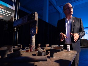 Saskatchewan Research Council CEO Mike Crabtree explains how a 1500-degree furnace is used in part of the SRC's rare earth elements processing facility in Saskatoon.