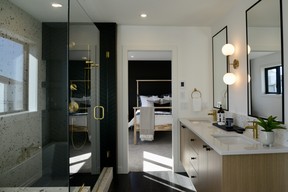 A deep soaking tub, tiled shower, double sink vanity and heated tile floor create a special space to relax and rejuvenate.