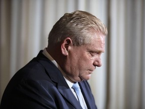 Ontario Premier Doug Ford at a news conference at the Queens Park legislature in Toronto on February 11, 2022, where announced he would be declaring a state of emergency in response to ongoing blockades in Ottawa and Windsor.