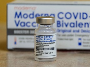 This photo shows a vial of the Moderna Covid-19 vaccine, Bivalent, at AltaMed Medical clinic in Los Angeles, California, on October 6, 2022. (Photo by RINGO CHIU / AFP)