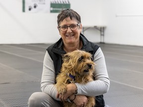 Liz Philips, past president of Hub City Kennel & Obedience Club, and her dog Carmella. The club recently moved to a new location just off Circle Drive on Alberta Ave.
