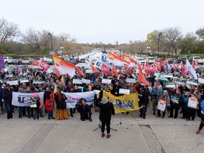 Members of various unions gather at a rally at the Legislative Building after the provincial government announced the closure of all SLGA retail liquor stores in the province. MICHAEL BELL / Regina Leader-Post