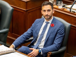 Ontario Education Minister Stephen Lecce answers questions in the Ontario Legislature during Question Period on Tuesday, as members debate a bill meant to avert a planned strike by 55,000 education workers.