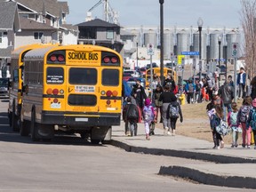 School buses wait to pick up students in Regina, Saskatchewan in May of 2021.
BRANDON HARDER/ Regina Leader-Post