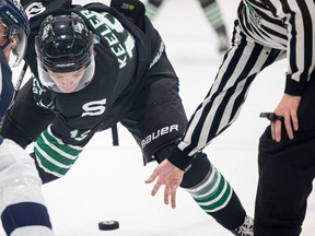 Liam Keeler, shown here taking a faceoff in this file photo, scored once in a 4-3 victory for the University of Saskatchewan Huskies over the University of Regina Cougars.