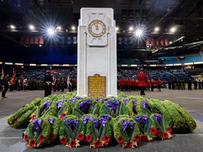 Wreaths are laid around the cenotaph at the Remembrance Day ceremony at SaskTel Centre in Saskatoon on Nov. 11, 2022.